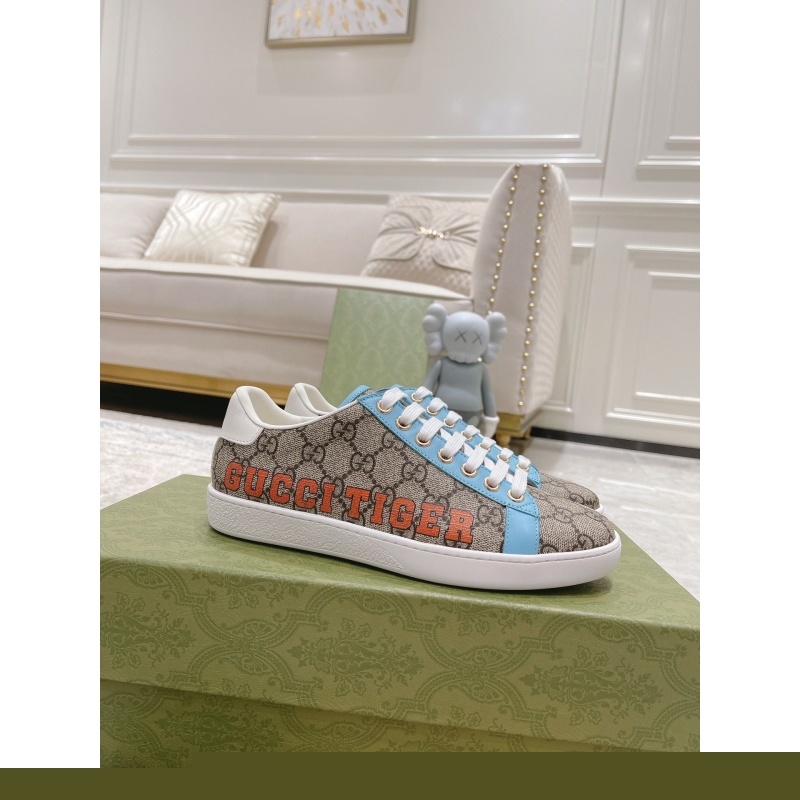 G*u*i sneakers